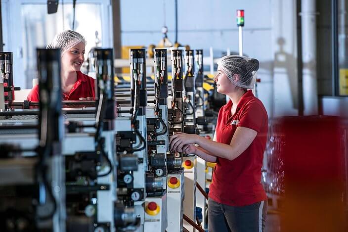 Cflex employees on the production line