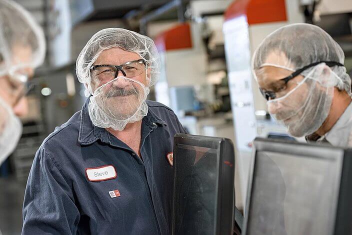 Cflex employees on the production line